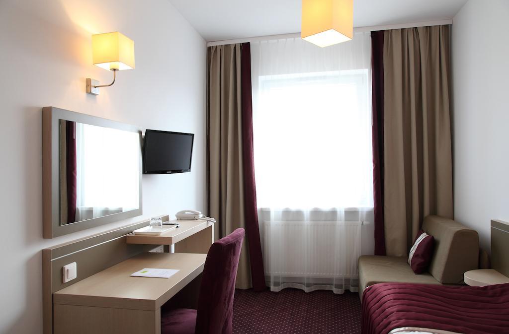 Arche Hotel Siedlce Quarto foto