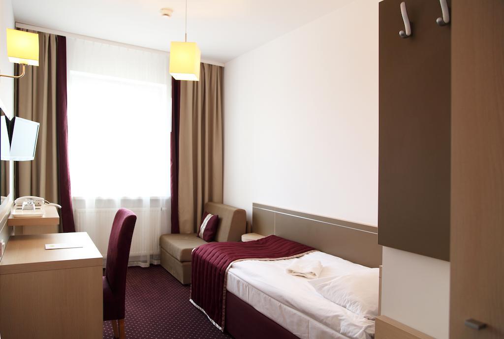 Arche Hotel Siedlce Quarto foto